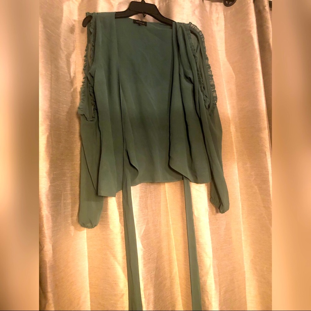 Majorelle forest green top. With slits on the shoulders and a wrap top.